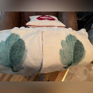 Two standard throw pillow covers with fern print on the